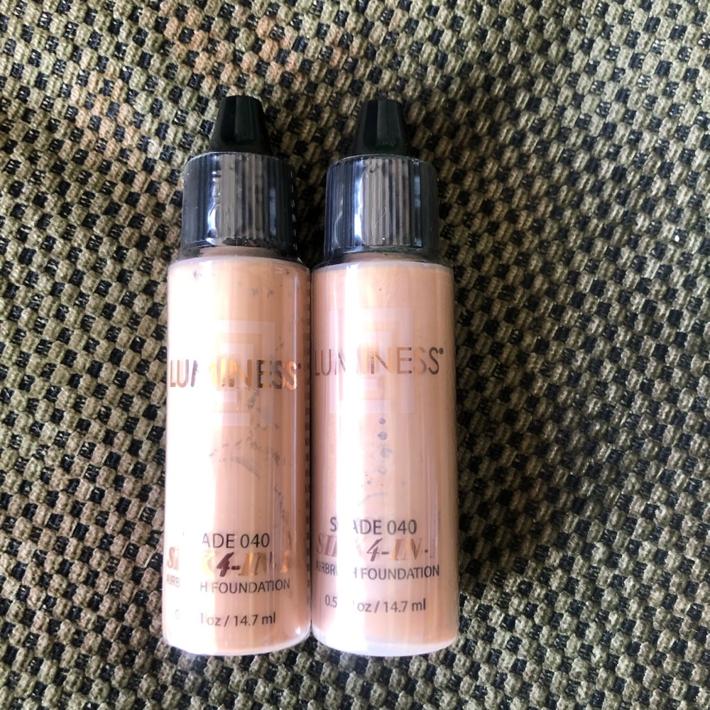 2 bottles of makeup